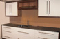 High gloss cream with walnut carcasses